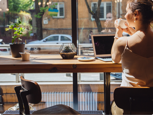 Working woman having a coffee in a cafe