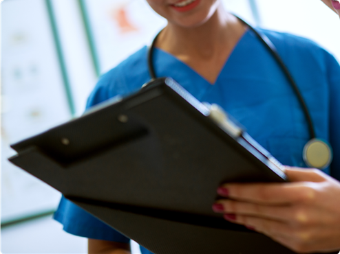 Nurse using clipboard